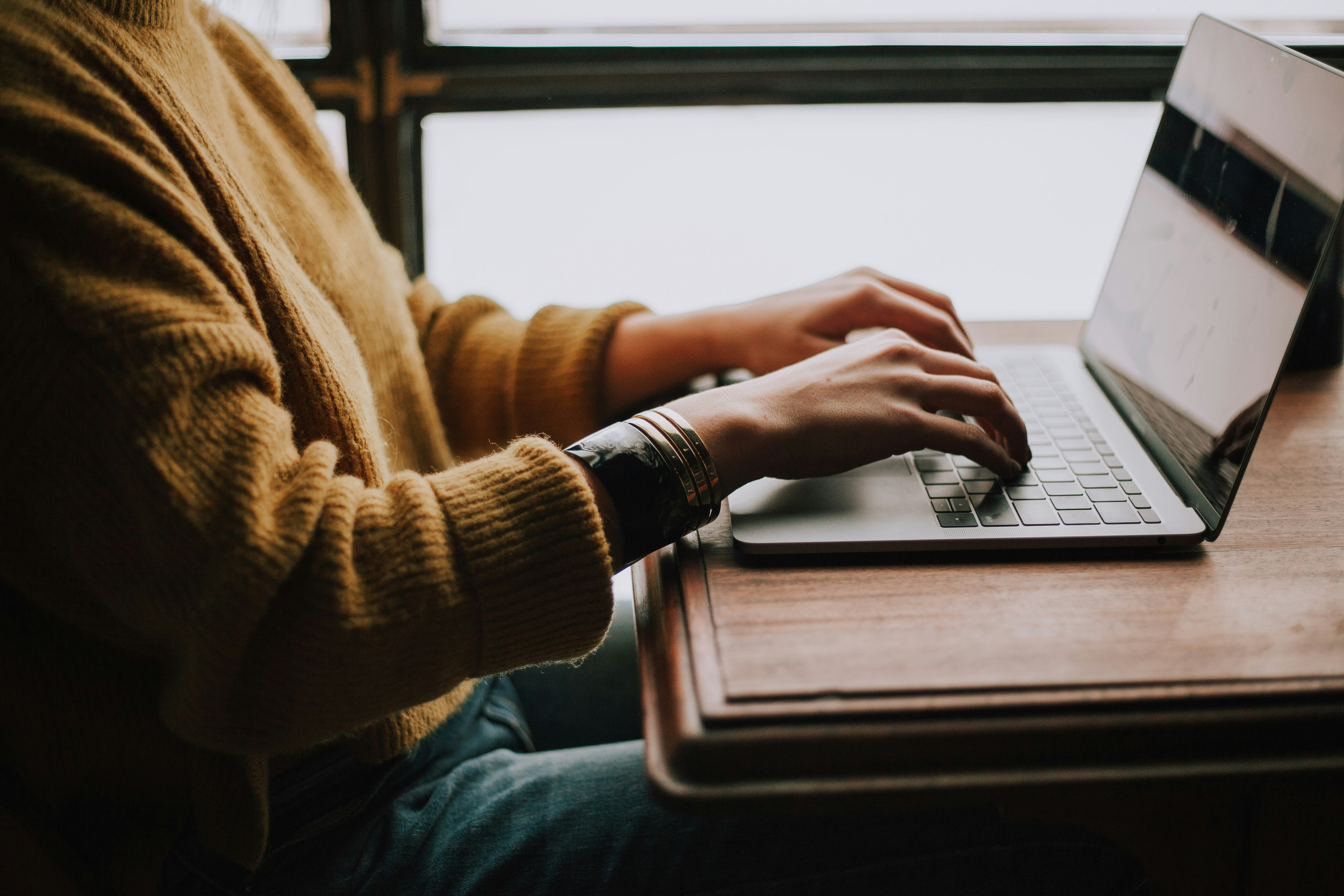 Person learning about crypto on a laptop